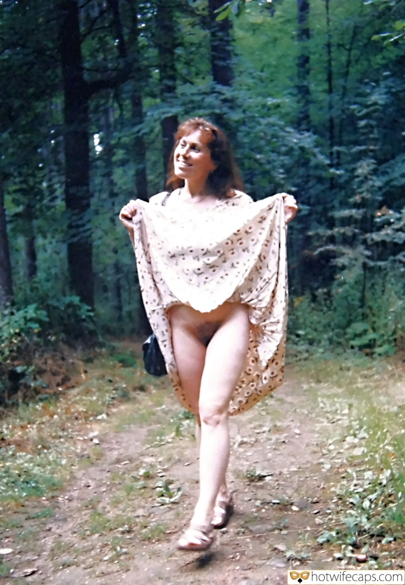 Submitted by Users 🔥 Public No Panties Flashing Feet Chastity Bottomless hotwife caption: A woman stands confidently in a forest, her smile hinting at a secret. Dressed in a floral dress, she exudes both innocence and allure, holding a clutch purs... Her Secret Smile: A Cuckold’s Daydream in the Forest